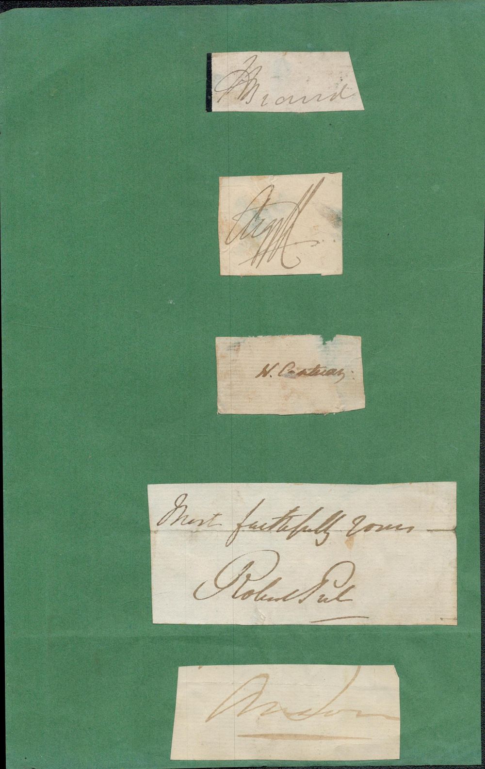 Lot 76: Clipped signature collection on album page. 5 in...
