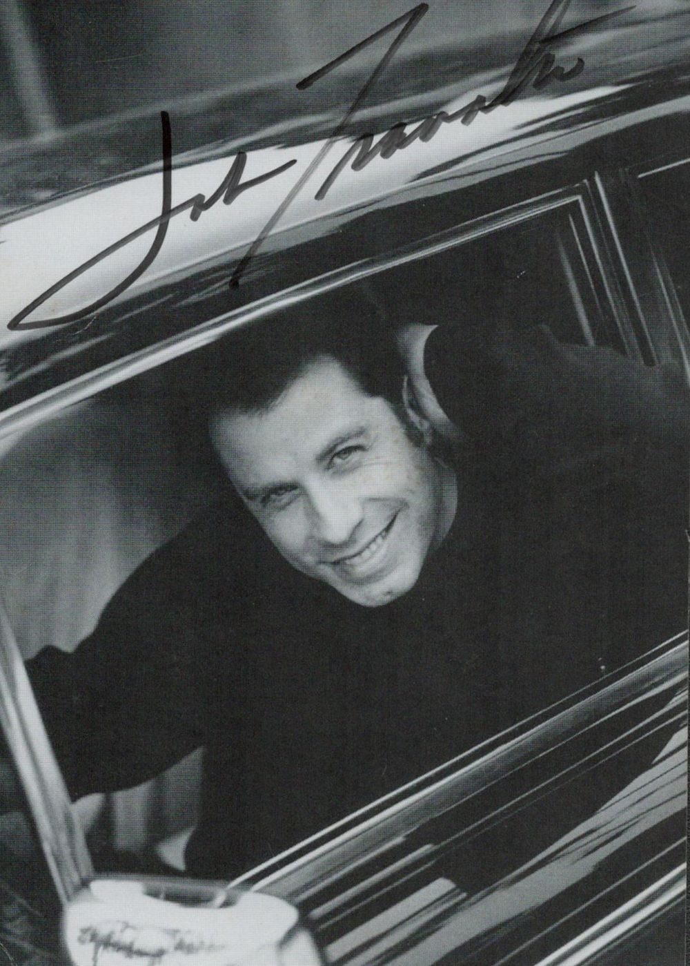 Lot 120: John Travolta signed 6x4inch black and white photo....