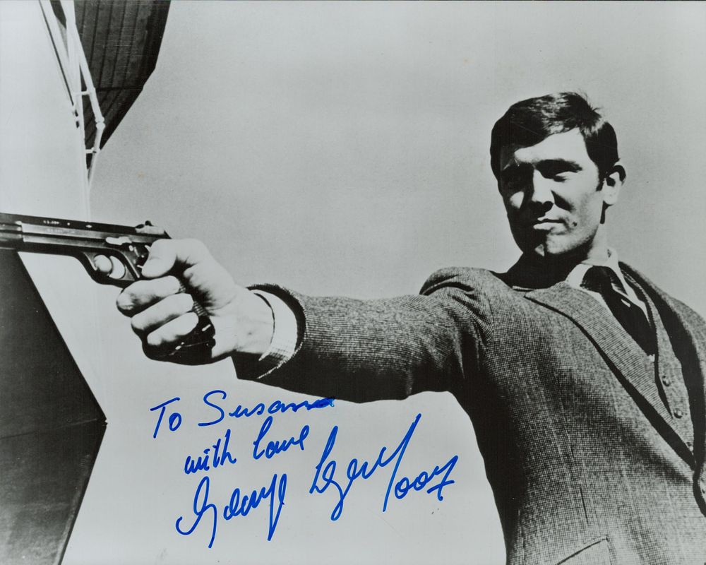 Lot 129: George Lazenby signed 10x8inch black and white photo....