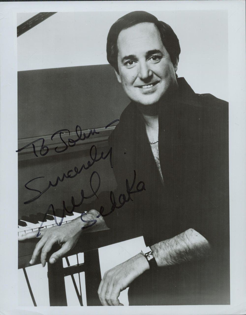 Lot 139: Neil Sedaka signed 10x8inch black and white photo....
