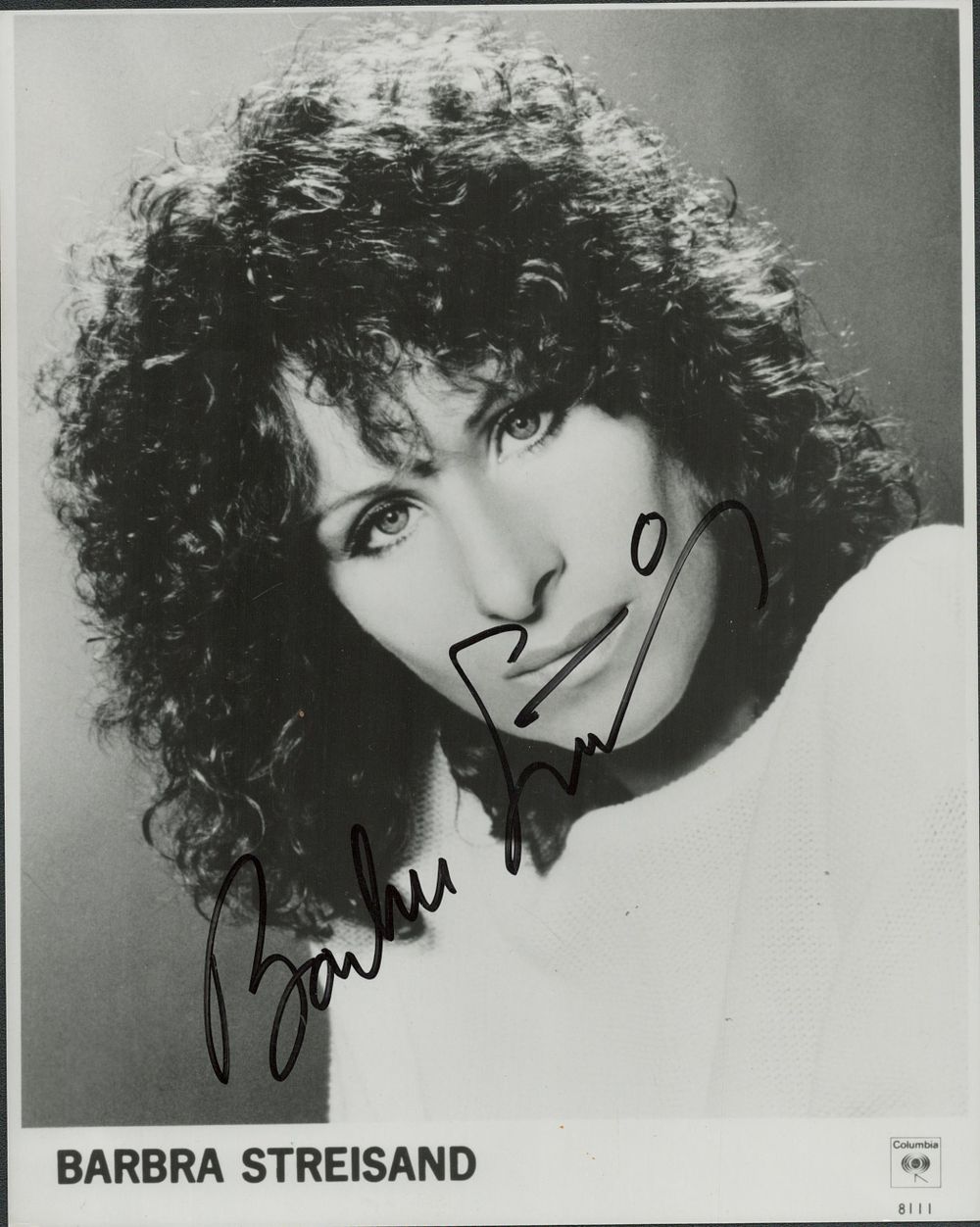 Lot 145: Barbra Streisand signed 10x8inch black and white photo....