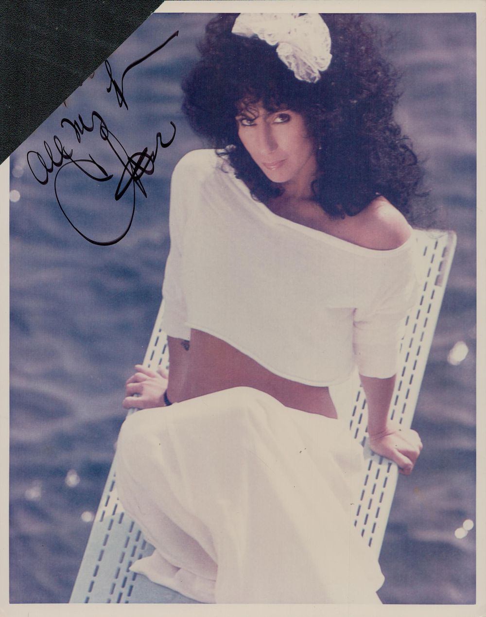 Lot 152: Cher signed 10x8inch colour photo. Top left corner...