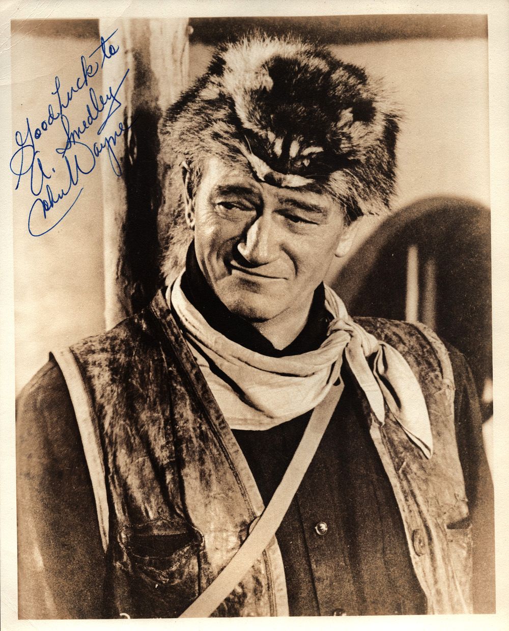 Lot 295: John Wayne signed 10x8 inch vintage black and...