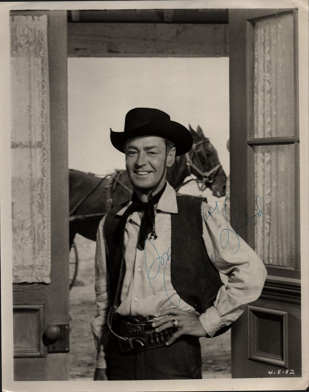 Lot 297: Alan Ladd signed 10x8 inch vintage black and...