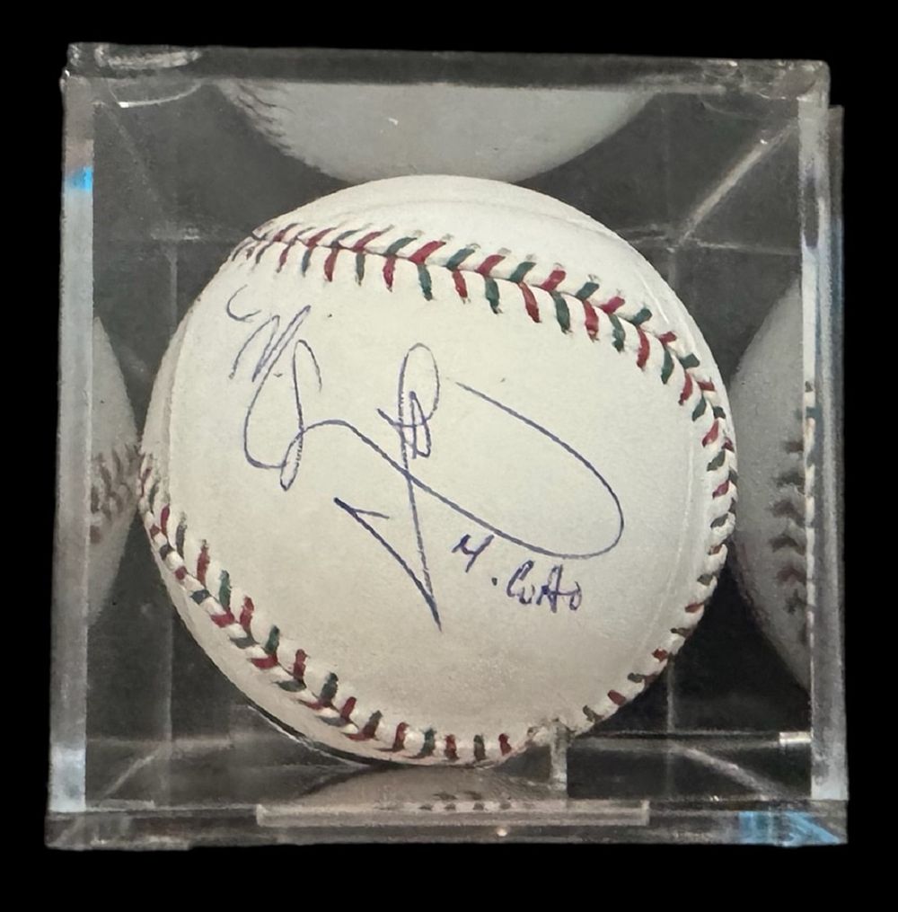 Lot 366: Miguel Cotto signed baseball in display case. (born...