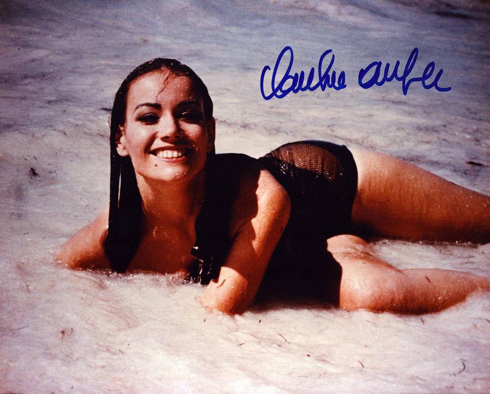 Lot 379: Claudine Auger signed 10x8 inch James Bond colour...