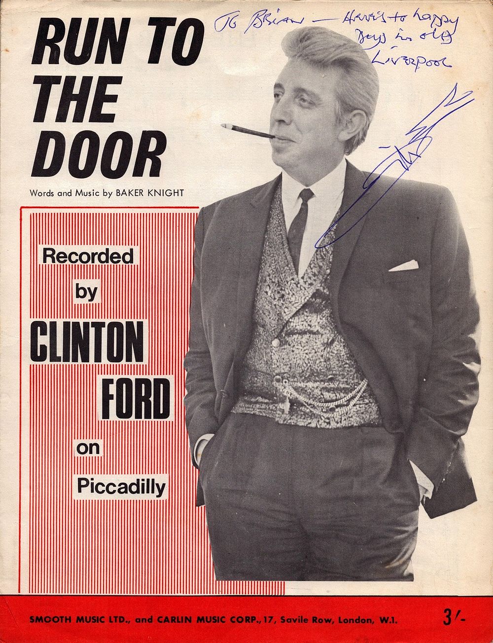 Lot 559: Clinton Ford signed Run to the Door vintage...