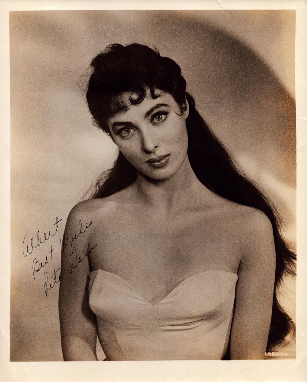Lot 597: Rita Gam signed 10x8 inch sepia photo. Good...
