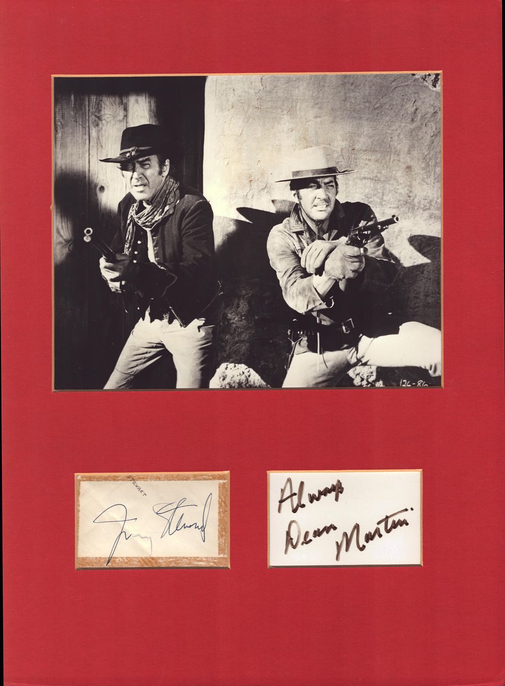 Lot 47: James Stewart and Dean Martin signature pieces mounted...
