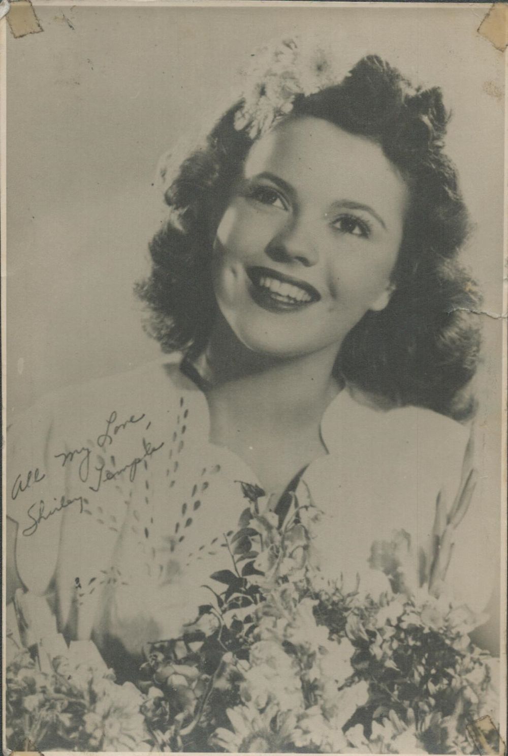 Lot 107: Shirley Temple signed 6x4 inch vintage black and...