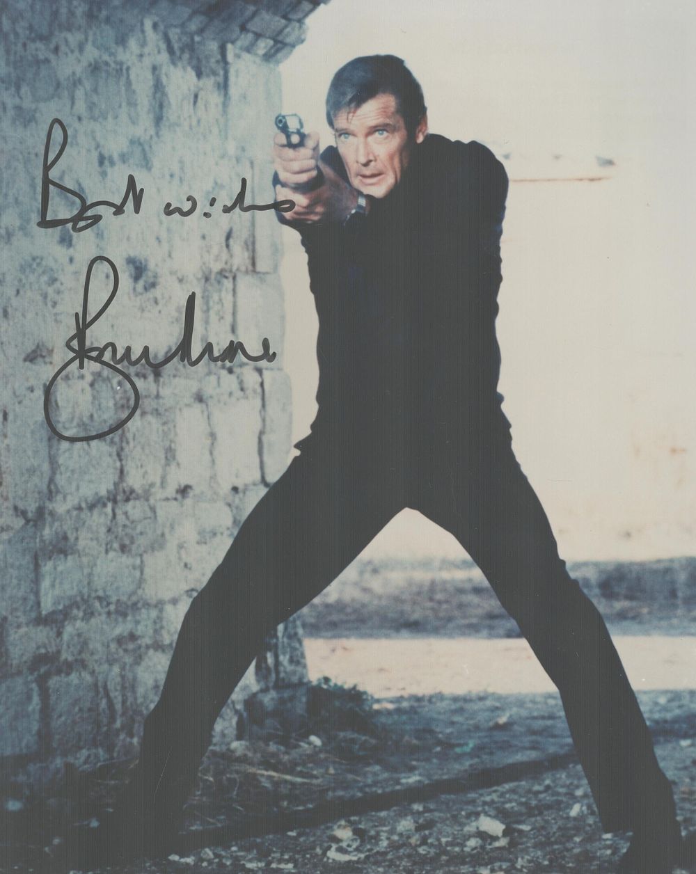 Lot 162: Roger Moore signed 10x8 inch James Bond colour...