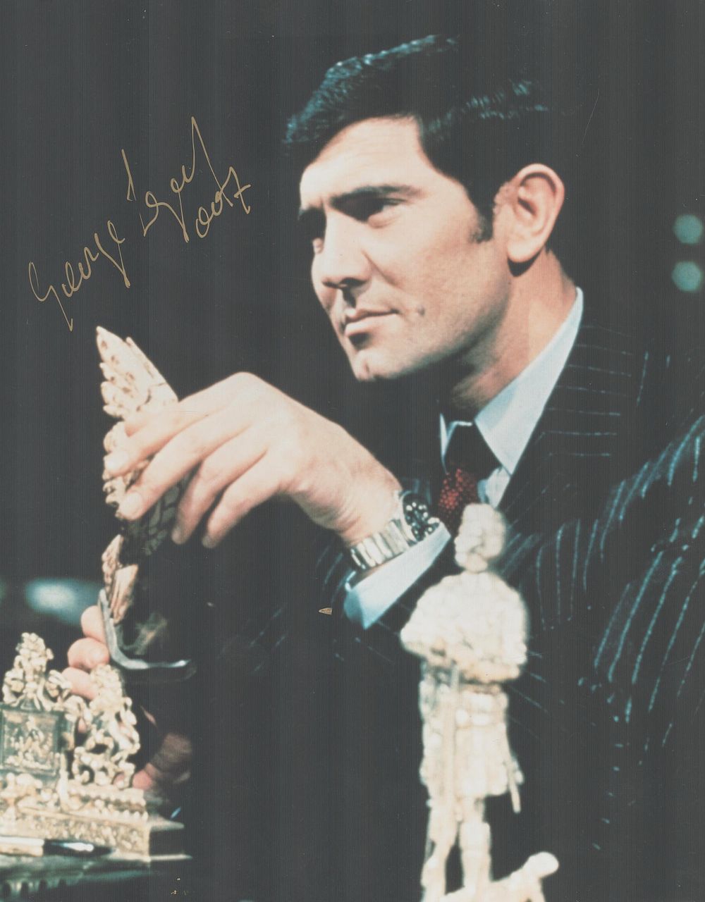 Lot 172: George Lazenby signed 10x8 inch James Bond colour...