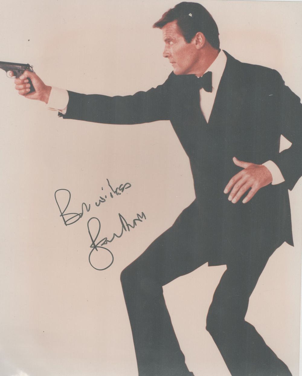 Lot 176: Roger Moore signed 10x8 inch James Bond colour...