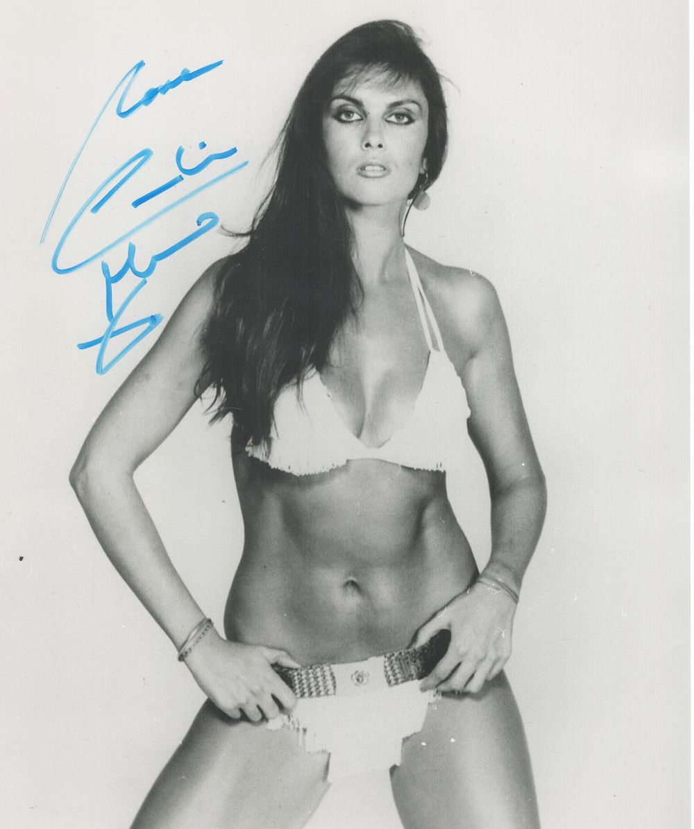 Lot 181: Caroline Munro signed 10x8 inch black and white...