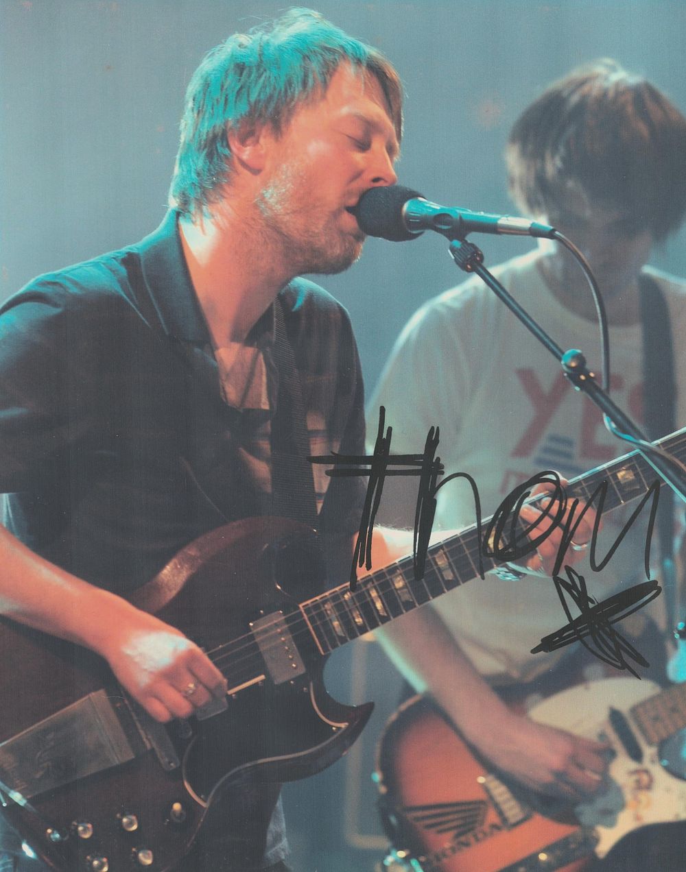 Lot 215: Thom Yorke signed 10x8 inch colour photo. Good...