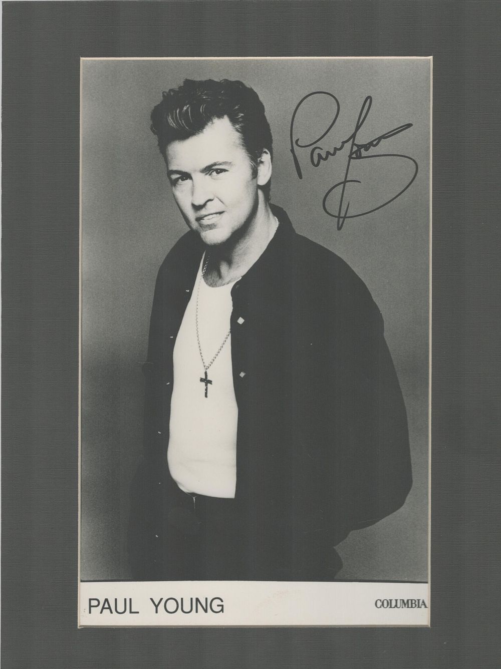 Lot 217: Paul Young signed 12x8 inch overall mounted black...