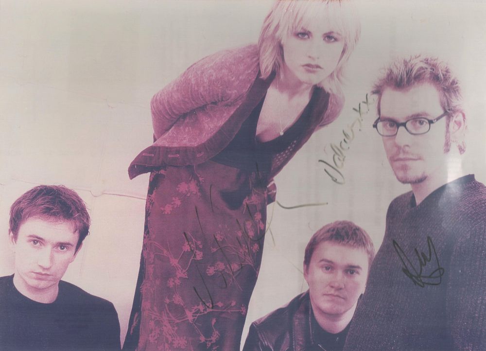 Lot 229: The Cranberries multi signed 12x8 inch colour photo....