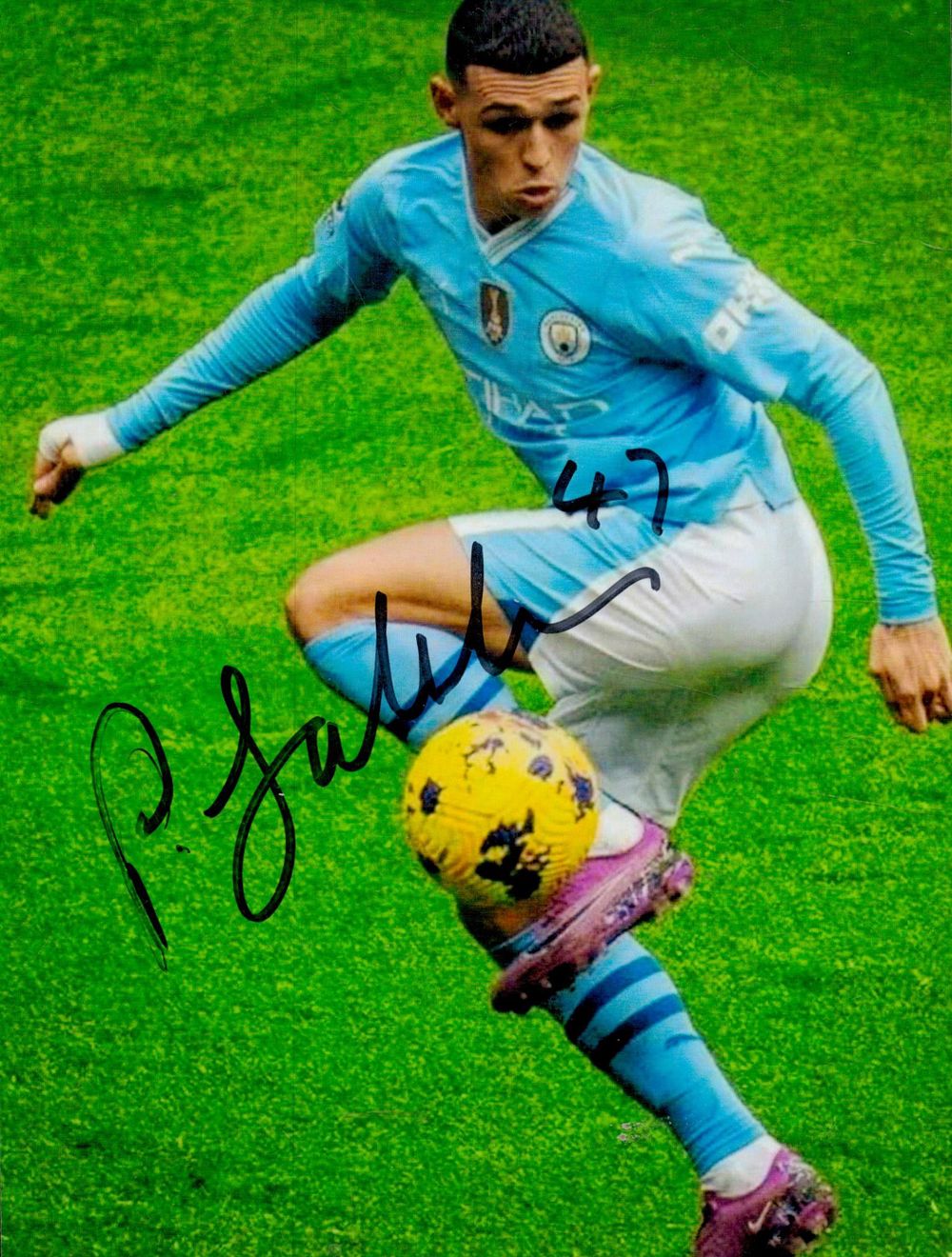 Lot 291: Phil Foden signed 8x6inch colour action photo of...