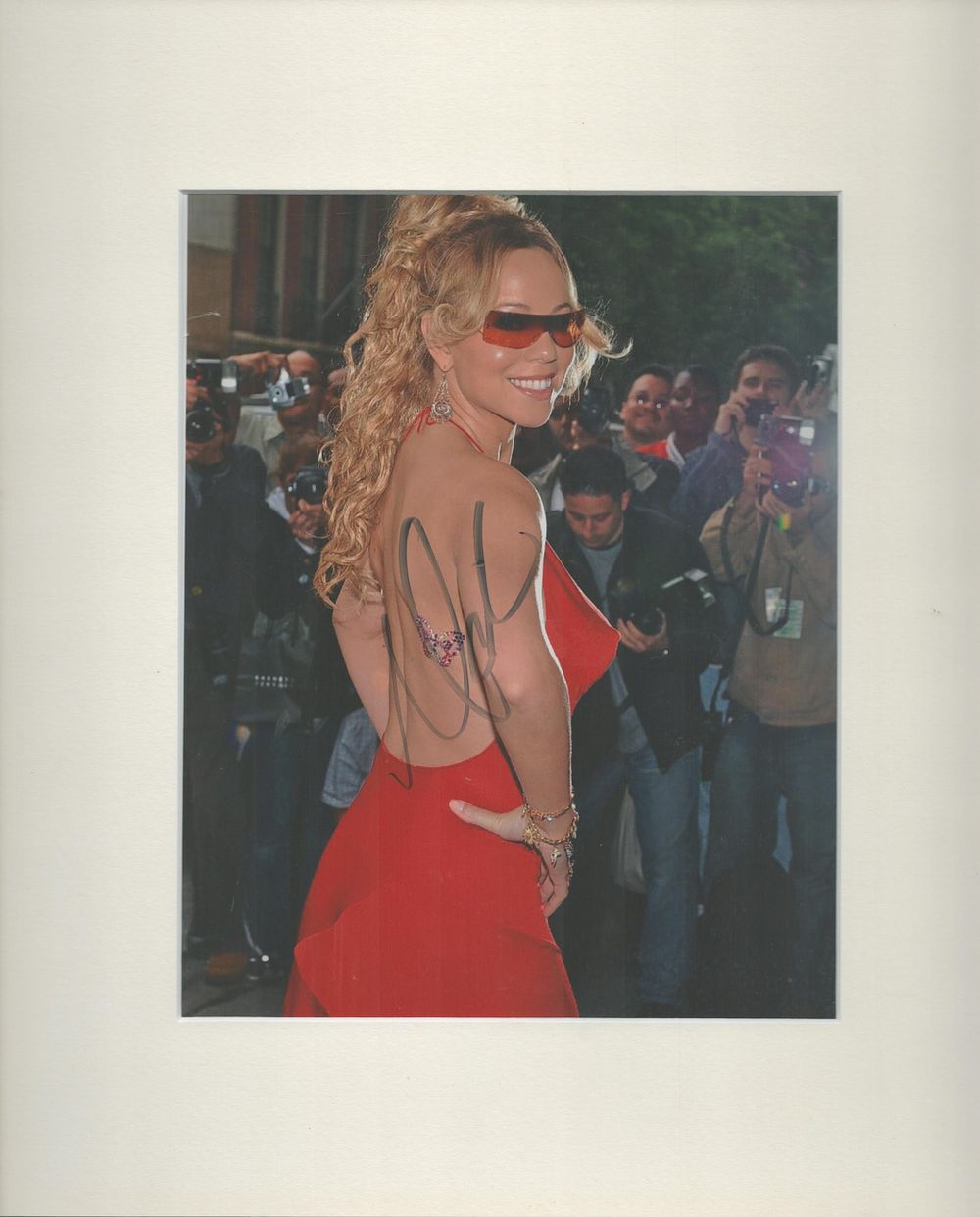 Lot 333: Mariah Carey signed colour photo 10.5x8 Inch, mounted...