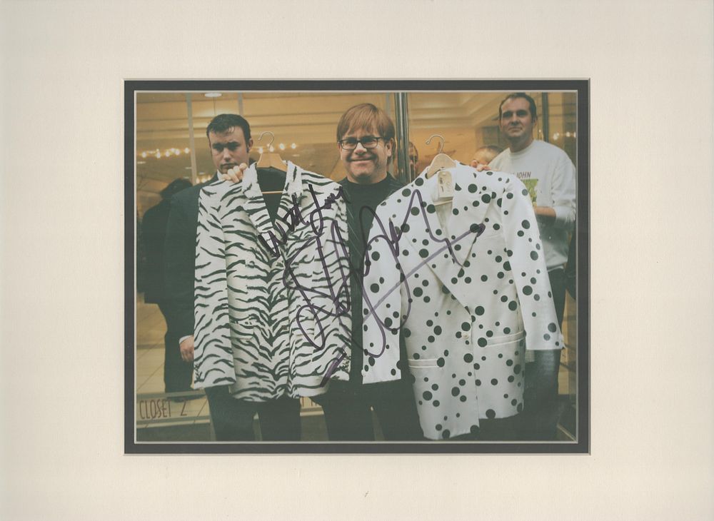 Lot 334: Sir Elton John, CH CBE signed colour photo...