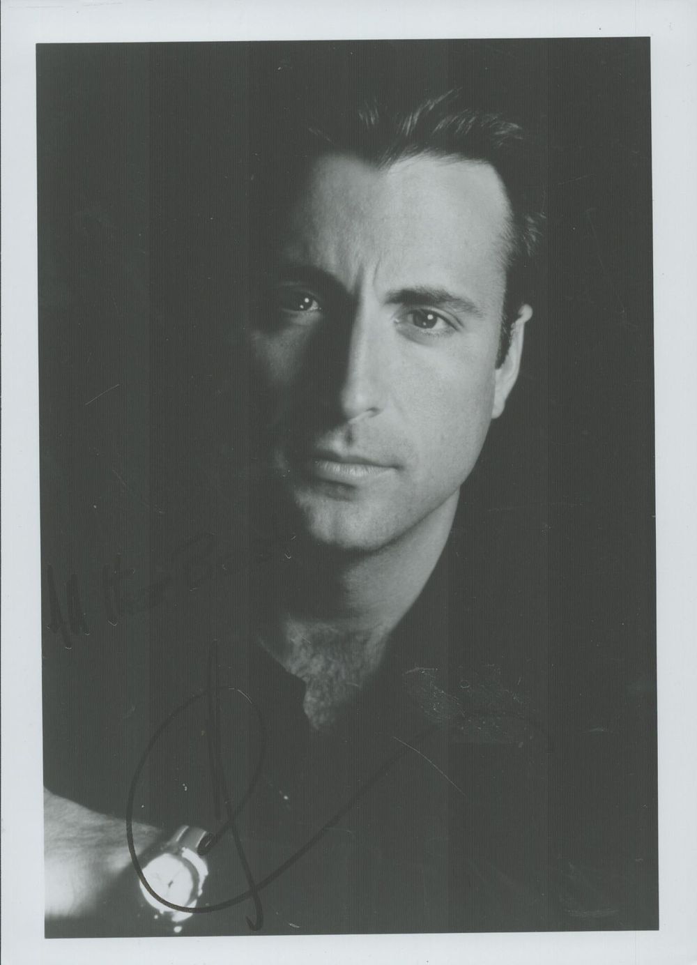 Lot 362: Andy García signed on back of black &...