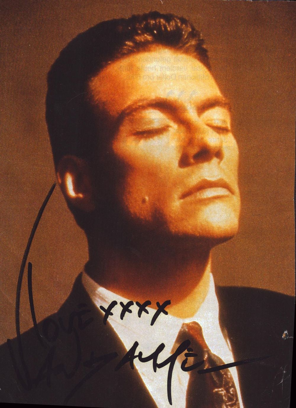 Lot 619: Jean-Claude Van Damme signed colour magazine photo 6x4.5...