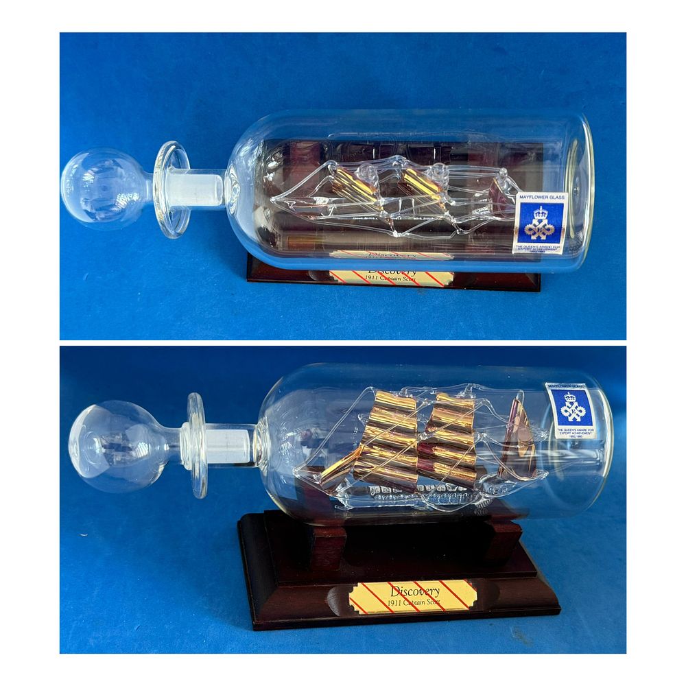 Lot 657: Discovery 1911 Captain Scott glass ship in glass...