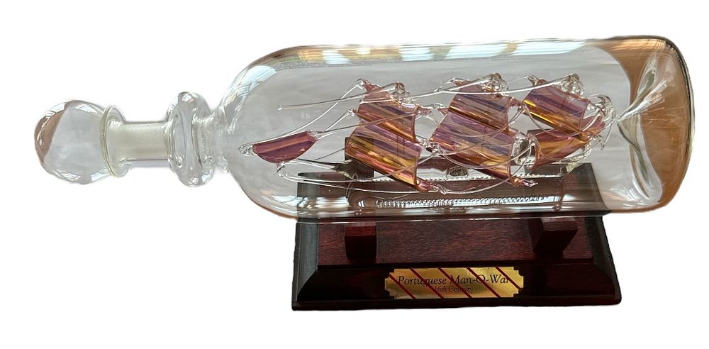 Lot 667: Portuguese Man-O-War 16th Century glass ship in glass...