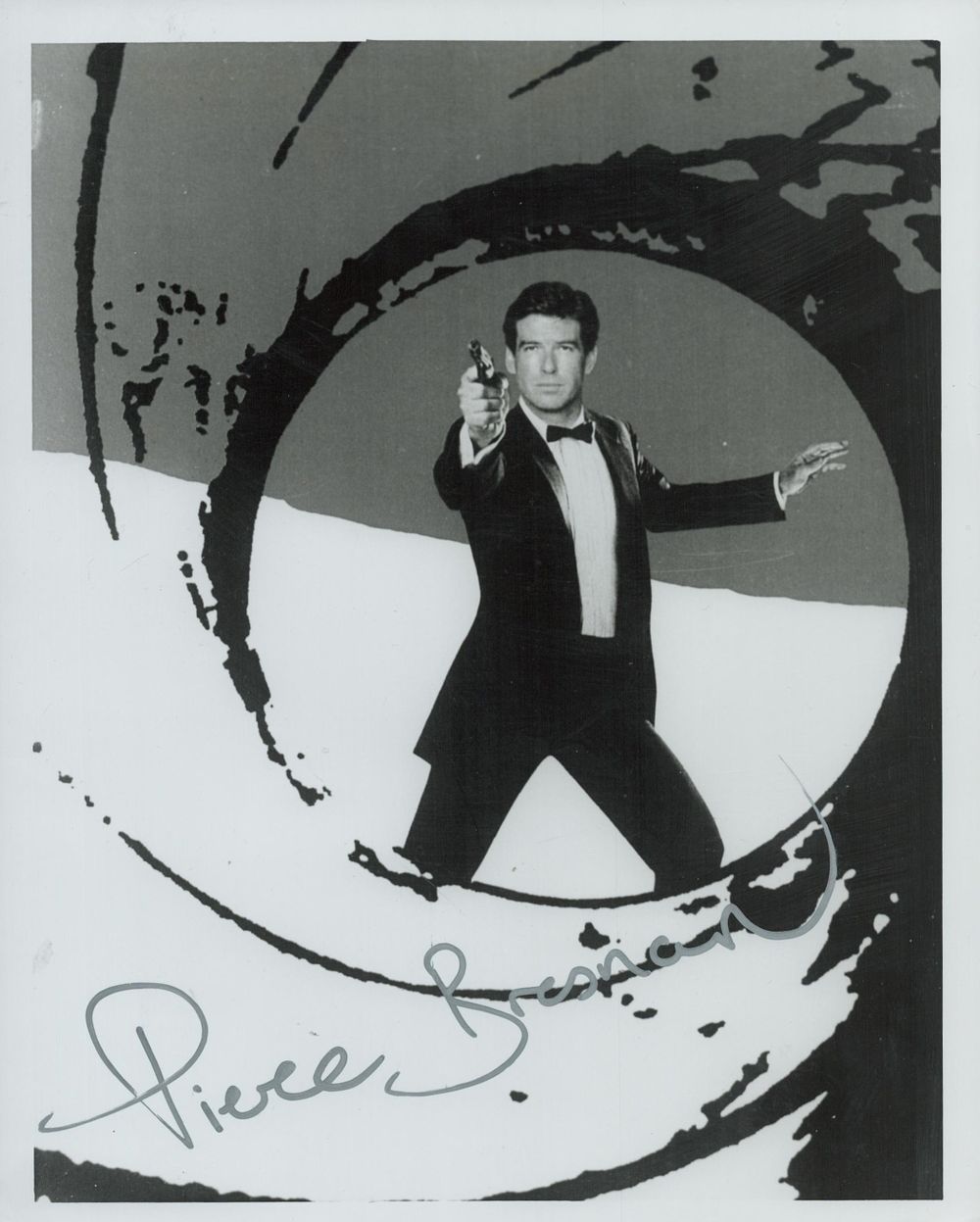 Lot 399: Pierce Brosnan signed 10x8 inch James Bond black...