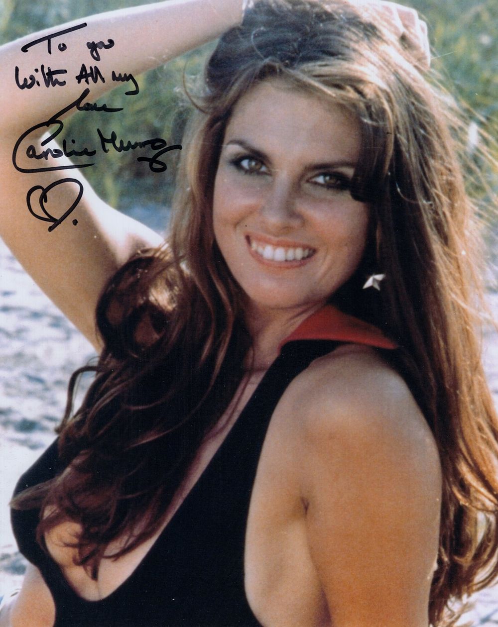 Lot 523: Caroline Munro, actress and model signed BandW 8x10...