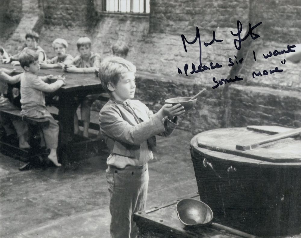 Lot 561: Oliver! 8x10 inch BandW photo from one of...