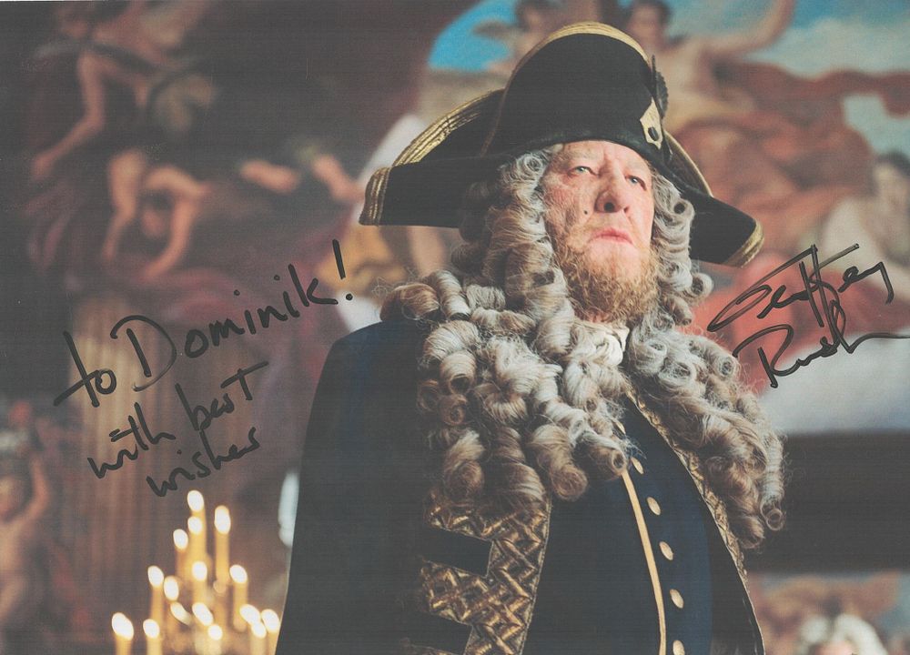 Lot 23: Geoffrey Rush, actor. A signed and dedicated 11x8...