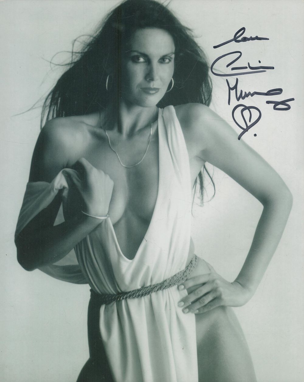 Lot 83: Caroline Munro signed 10x8 inch black and white...