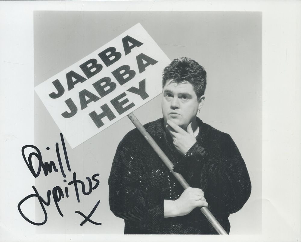 Lot 141: Phil Jupitus signed 10x8inch black and white photo....