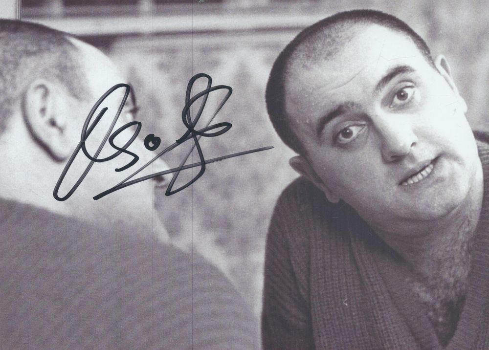 Lot 155: Alexei Sayle signed 7x5inch black and white photo....