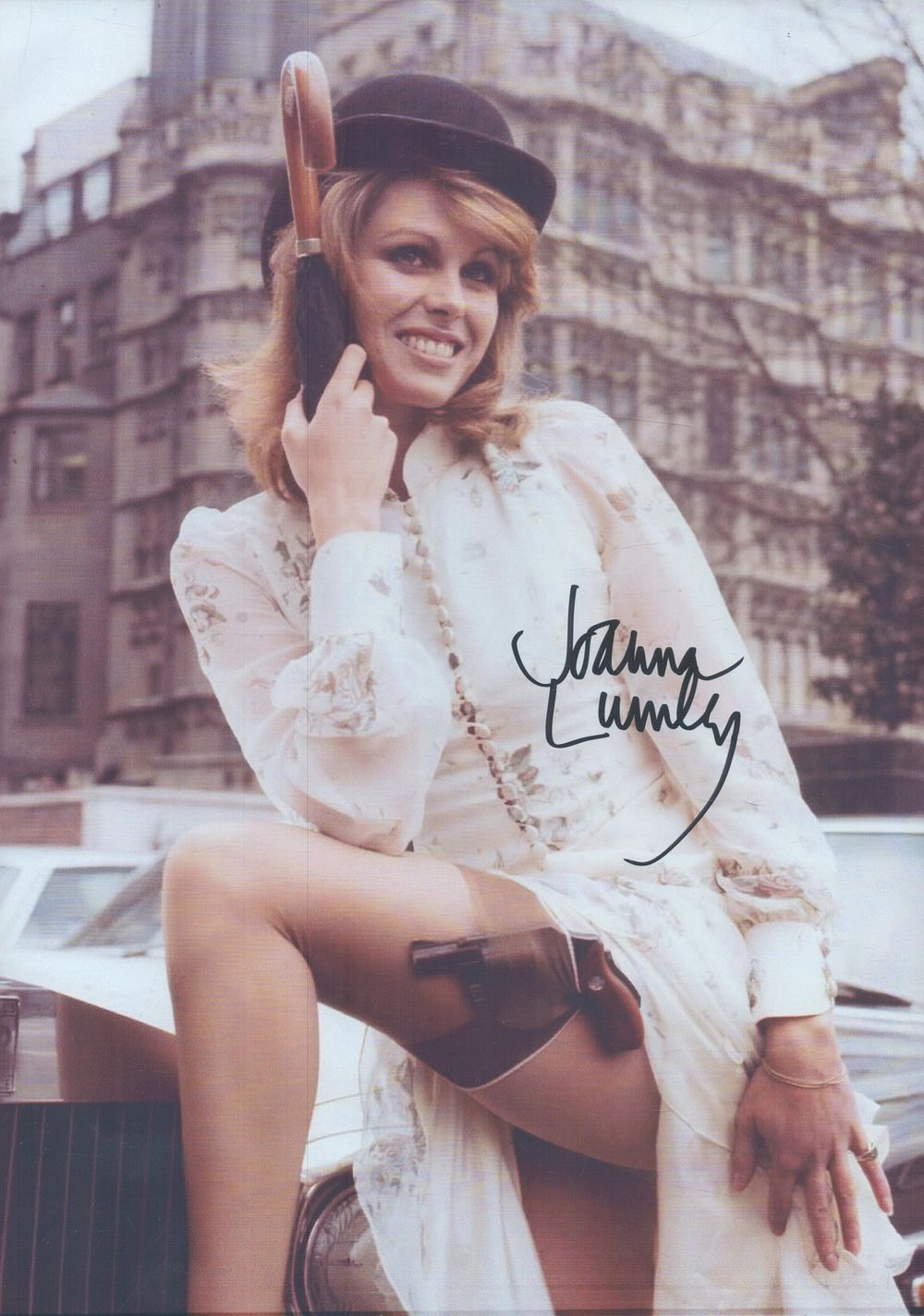 Lot 181: Joanna Lumley signed 12x8inch colour photo. Good condition....