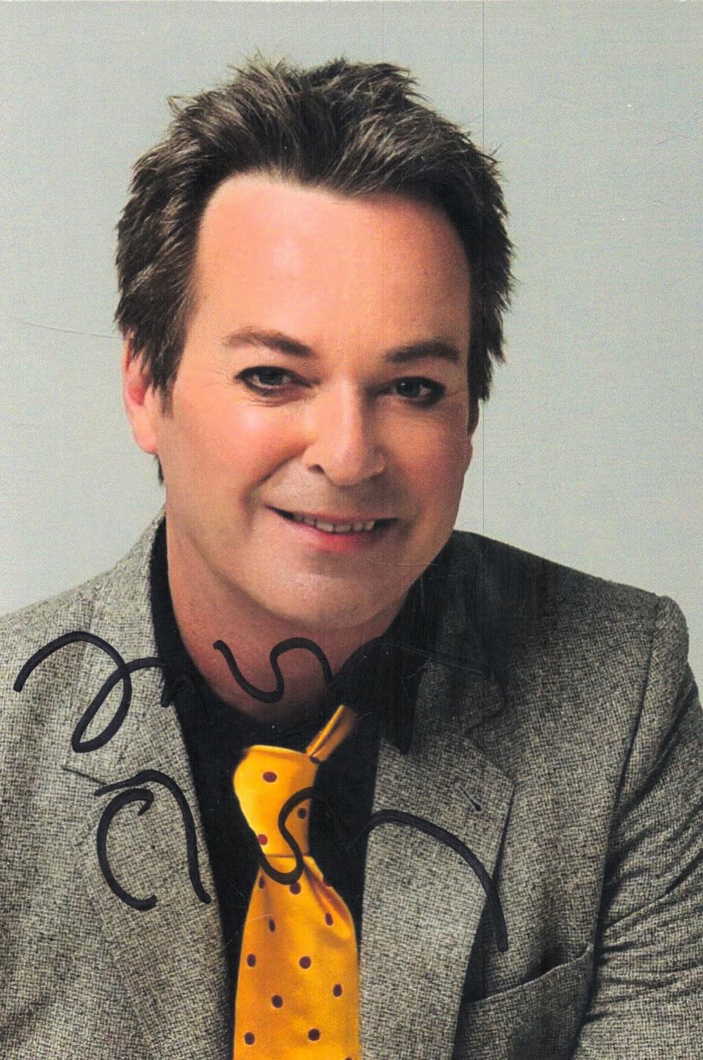 Lot 217: Julian Clary signed 6x4inch colour photo. Good condition....