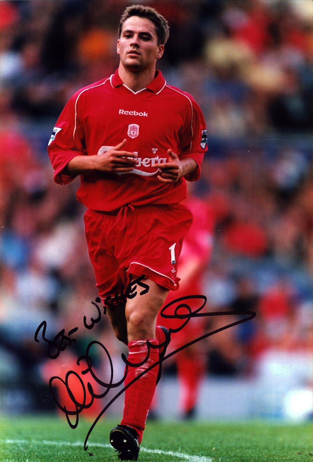 Lot 721: Michael Owen Signed Liverpool 8x12 Photo. Good condition....