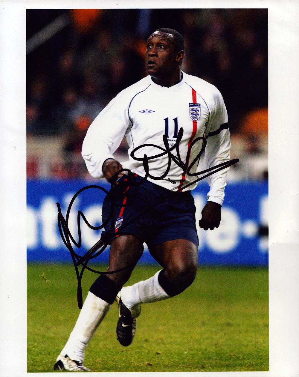 Lot 732: Emile Heskey Signed England 8x10 Photo. Good condition....