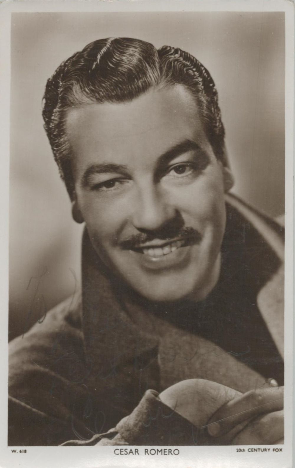 Lot 195: Cesar Romero signed 6x4 inch black and white...