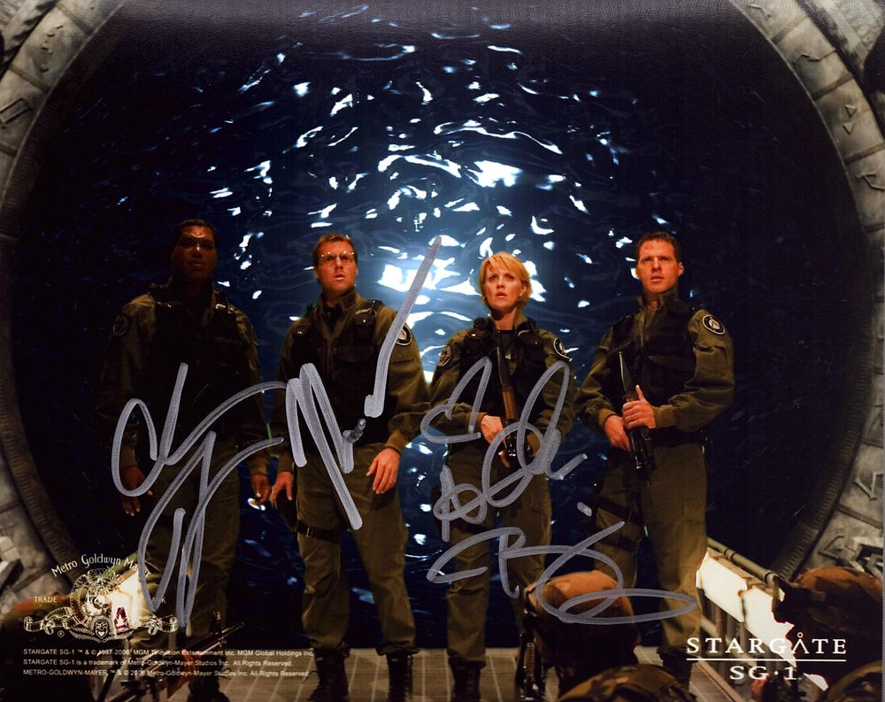 Lot 256: Amanda Tapping, Chris Judge and Michael Shanks signed...