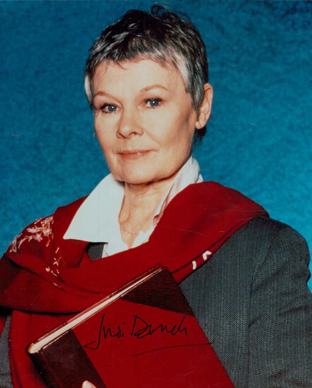 Lot 324: Dame Judi Dench signed 10x8 inch colour photo....