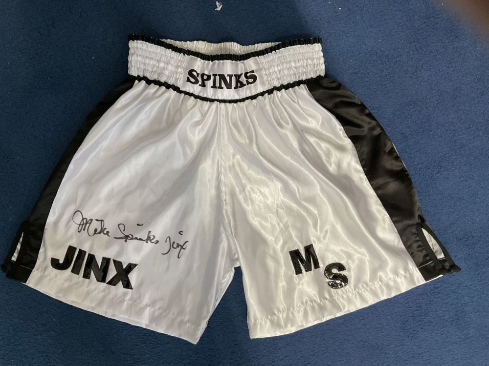 Lot 194: Michael Spinks signed replica personalised boxing shorts. Michael...