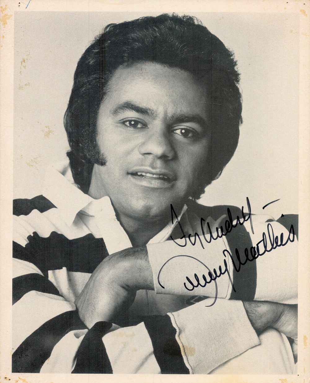 Lot 160: Johnny Mathis signed 10x8inch black and white photo....