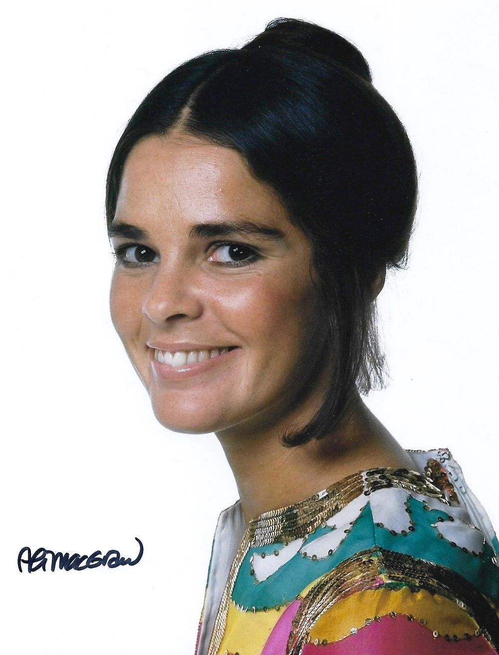 Lot 392: Ali MacGraw signed 10x8inch colour photo. Good Condition....