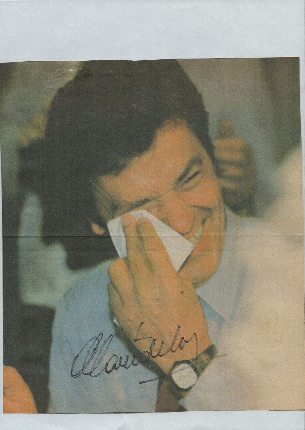 Lot 232: Alain Delon signed newspaper cut out colour pictured...