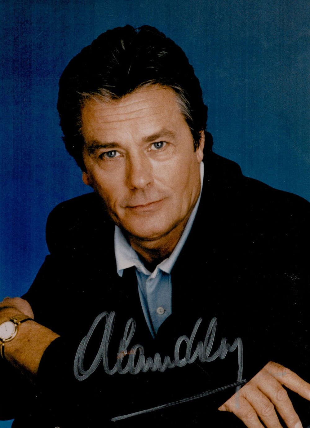 Lot 526: Alain Delon signed 8x6inch colour photo. Good condition....
