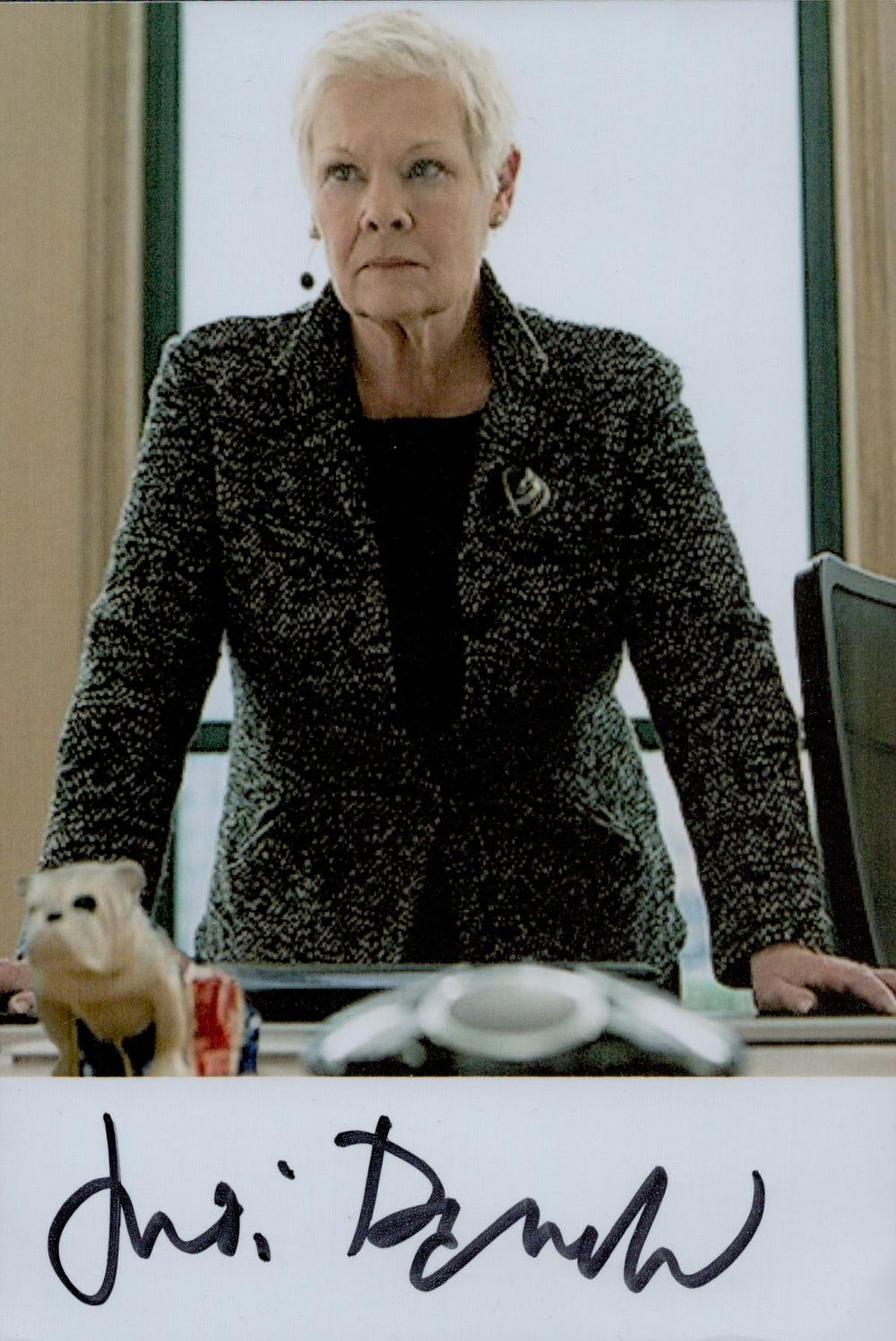 Lot 676: Judi Dench signed 6x4inch colour photo. Good condition....