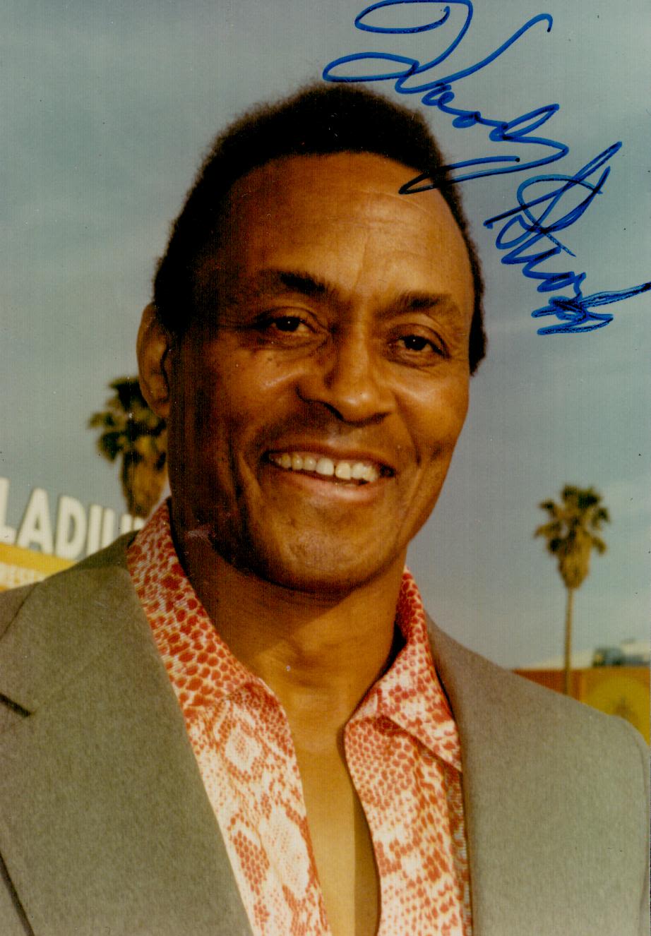 Lot 754: Sport Woody Strode signed 5x3 colour photo. Woodrow...