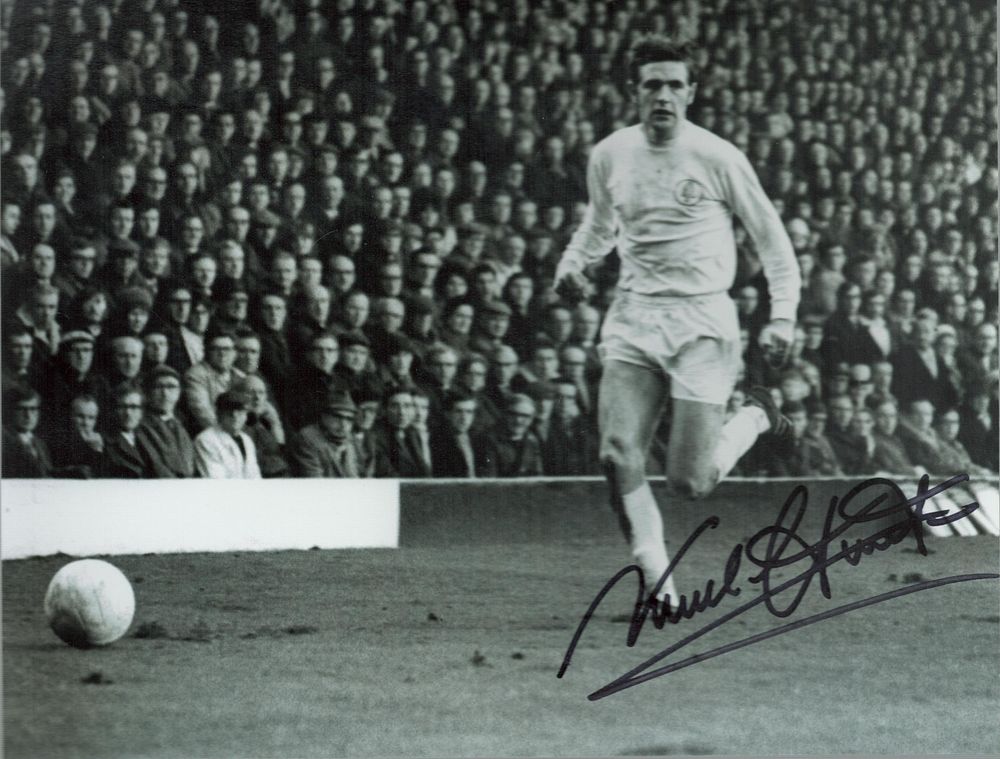Lot 167: Norman Hunter signed 10x8 inch black and white...